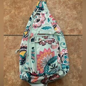 Vera Bradley sling backpack Mint flower design. Great condition!